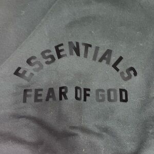 Essential fear of God black sweater
